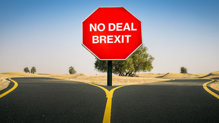 No Deal Brexit written on octagon stop sign with two different paths