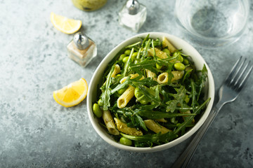 Pasta salad with pesto and arugula