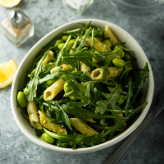 Pasta salad with pesto and arugula