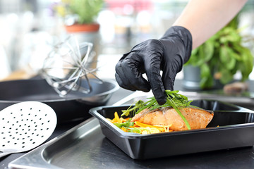 Box diet. The cook prepares take-out dishes.
