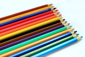 Bright color pencils on a white background