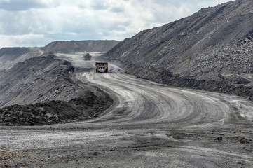 Quarry truck carries coal mined.