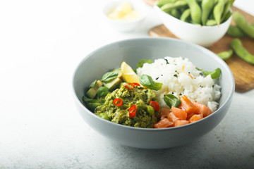 Rice bowl with smoked salmon and avocado