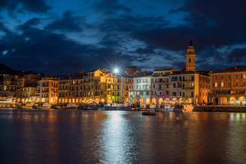 Fototapeta na wymiar Neighbourhood Oneglia by night - old harbor of the city of Imperia, Italy