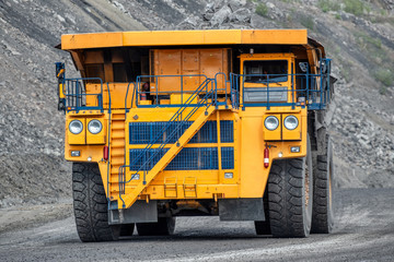 Large quarry dump truck. Transport industry.
