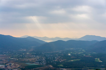 Sun Rays Through Clouds. Wiew of Sanya Bay