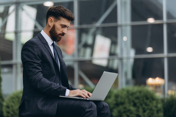 Two businessmen discussing together