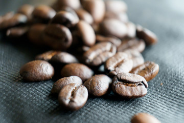 Roasted brown coffee bean Macro close up . Selective focus with copy space