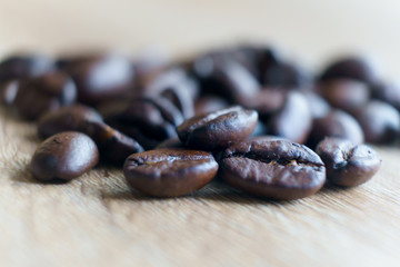 Roasted brown coffee bean Macro close up . Selective focus with copy space