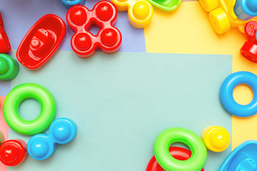 Colorful child kid’s education toys pattern background on the bright background. Childhood infancy children babies concept.