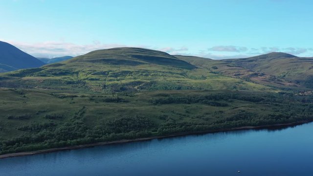 Aerial view of Loch Eil/Linnhe situated in landscape of Scottish Highlands, lush green hills and deep lake - panorama of Highlands of Scotland from above, United Kingdom, Great Britain, Europe