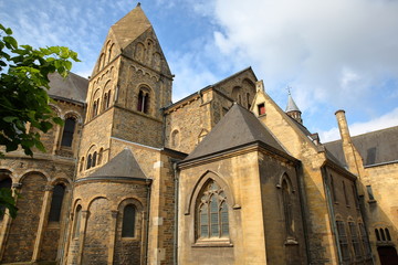 Fototapeta na wymiar The external Eastern facade of the basilica of our Lady ( 11th century), a Roman Catholic parish church, Limbourg, Maastricht, Netherlands