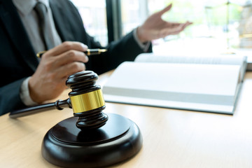 Judge or lawyer talking  with team