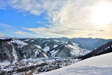 Fototapeta na wymiar landscape with Cheia village and Bucegi mountains in winter