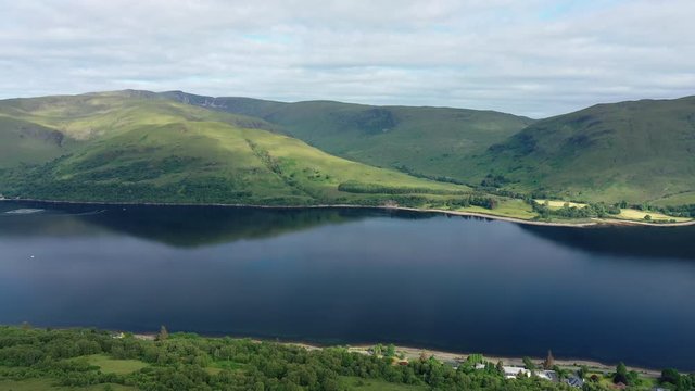 Aerial view of Loch Eil/Linnhe situated in landscape of Scottish Highlands, lush green hills and deep lake - panorama of Highlands of Scotland from above, United Kingdom, Great Britain, Europe