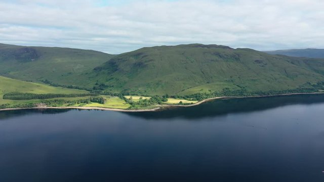 Aerial view of Loch Eil/Linnhe situated in landscape of Scottish Highlands, lush green hills and deep lake - panorama of Highlands of Scotland from above, United Kingdom, Great Britain, Europe
