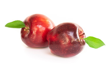 Fresh red apple fruit with green leaf isolated on white background, Healthy food concept