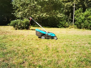 Fototapeta premium mowing the lawn