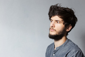 Obraz premium Profile portrait of thoughtful man.