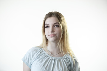 Teenager girl is thinking deciding serious on the white background