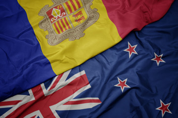 waving colorful flag of new zealand and national flag of andorra,andorran,spain,.