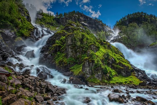 Latefossen (Latefoss) twin waterfall - one of the biggest waterfalls in Norway, nearby Odda. HDR image, july 2019