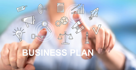 Woman touching a business plan concept
