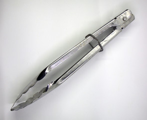 Serving kitchen tongs isolated on a white background