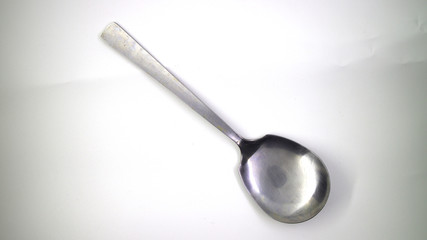 Metal kitchen soup ladle isolated on white background