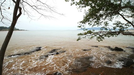4k video of sea wave with stone at Khao Laem Ya in Mu Ko Samet National Park, Rayong Province, Thailand