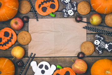 Delicious Ginger Biscuits Cookies and Apples for Halloween on Wooden Background Halloween Background Horizontal view From Above Frame Copy Space