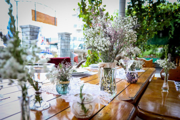 Served table decorated with flowers