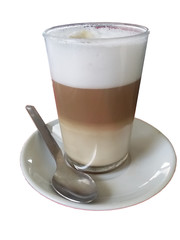  glass of isolated layered coffee, likely a latte macchiato or café bombón, with distinct layers of milk, coffee, and foam. The glass is placed on a white saucer with a metal spoon beside it. 