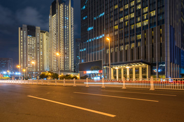 Office buildings and highways at night in the financial center, qingdao, China