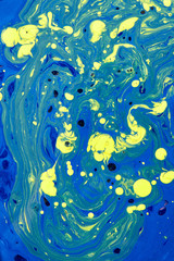 Fototapeta na wymiar Mixed acrylic paint background in yellow-blue colours.