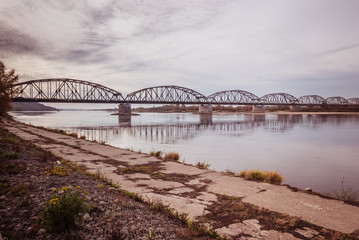 Naklejka premium Steel road and railway bridge on the Vistula River in Grudziadz in Poland