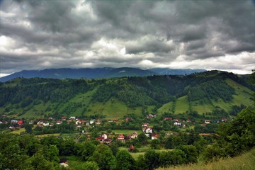 Fototapeta na wymiar Cheia village and Bucegi mountains