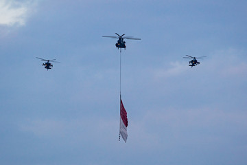 State Flag flypast by three RSAF helicopters on NDP at Singapore.
