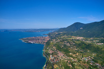 Fototapeta na wymiar Aerial photography with drone. Steep Cliffs By the Water, Lake Garda, Italy.