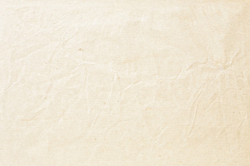 Crumpled brown yellow paper texture
