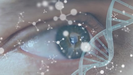 Turning DNA strand with blue eye in the background - Powered by Adobe