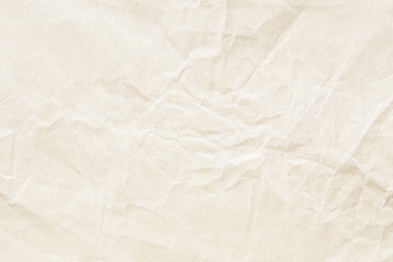 Crumpled brown yellow paper texture