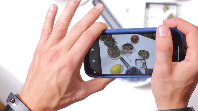 blogger takes pictures of marijuana, vaporizer with food