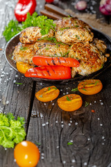 homemade meatballs, cutlets fried from red and white fish meat, in a vintage rustic bowl plate,...