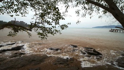 4k video of sea wave with stone at Khao Laem Ya in Mu Ko Samet National Park, Rayong Province, Thailand