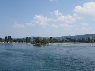 Boats at beautiful Rhine River landscape in european STEIN am RHEIN town in SWITZERLAND in swiss...