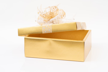 Gold gift box on white background