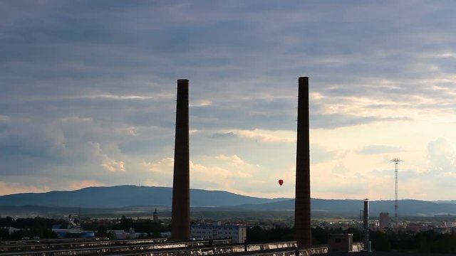 City Ceske Budejovice in sunset with old foundry and hot air ballon, Czech republic