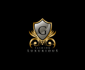 Luxury Golden Shield Logo with G Letter,  royal shield logo icon.