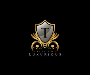 Luxury Golden Shield Logo with T Letter,  royal shield logo icon.
